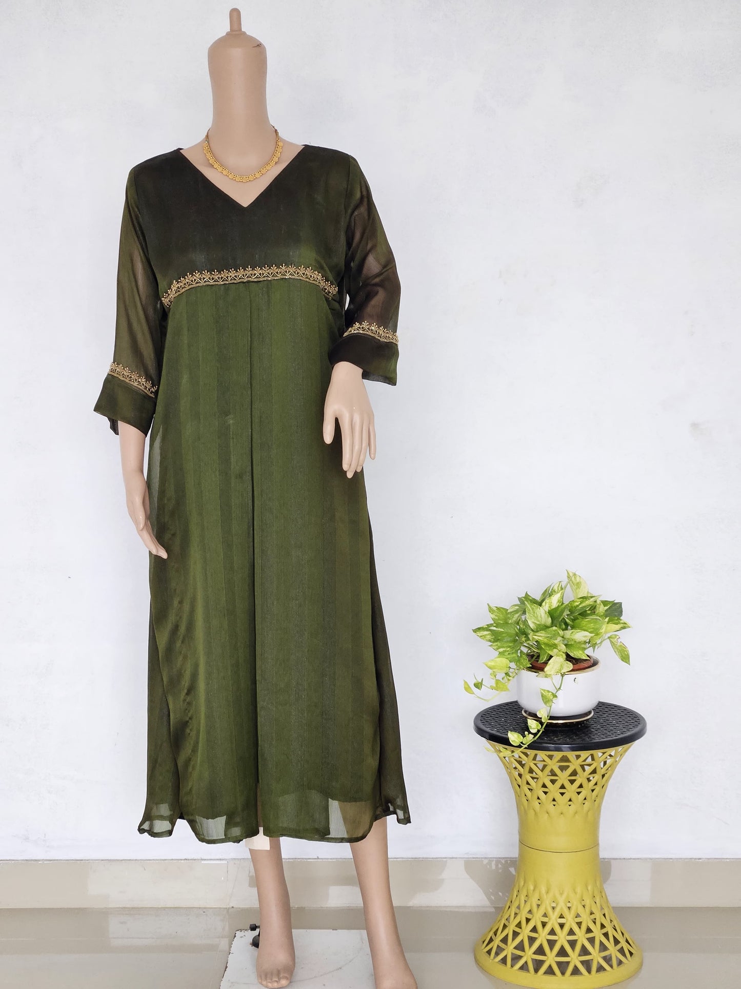 Hand worked designer Kurtis W12